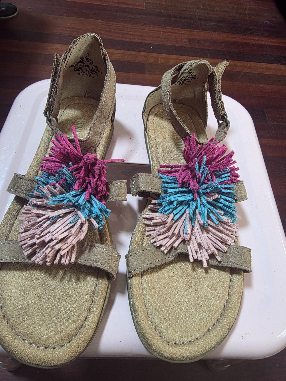 Minnetonka Girls Tan Suede Sandals with Pink, Blue & Light Pink Pom Pom Accents